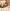 Wooden hamster habitat with exercise wheel, coconut hideout, tunnels, and playful hamsters