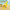 Yellow cartoon animal-shaped pet litter scoop sifting clumped sand in a desert scene