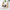 Wooden hamster triangle swing with white hamster on seat, ideal for small pet exercise and play