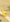 Yellow animal-shaped sand scoop with slotted bottom for cleaning pet enclosures in desert setting