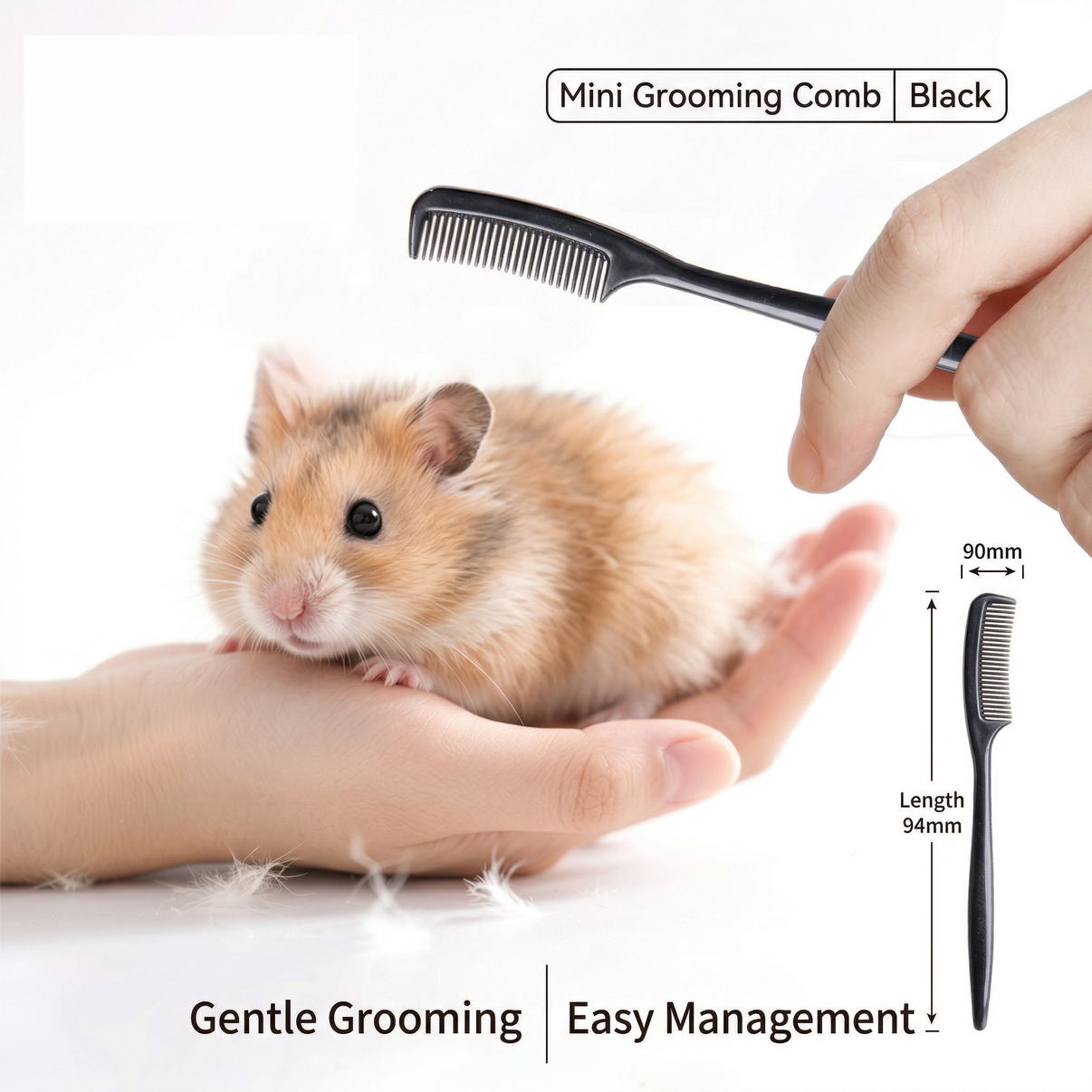 Mini black grooming comb for small pets, shown grooming a hamster held in hand.